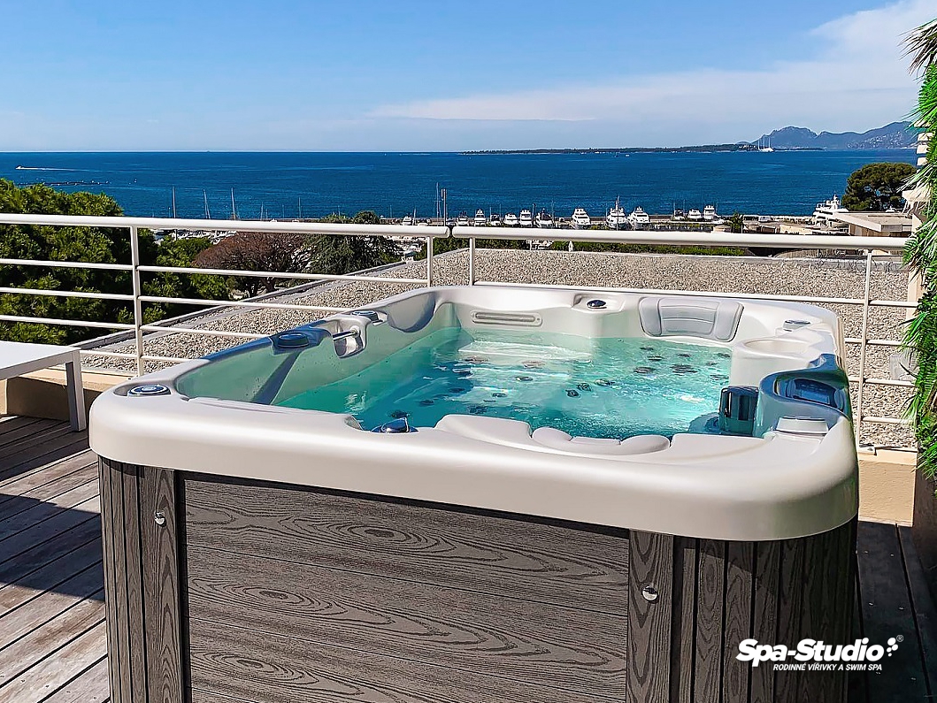 Amazing installation of massage whirlpool Corall by Canadian Spa International®. Jacuzzi on a roof terrace with beautiful sea view.