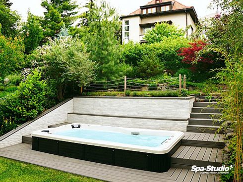 Low-energy swimming model SWIM SPA with counterflow combined with hydromassage seats for a garden or even for a home wellness.